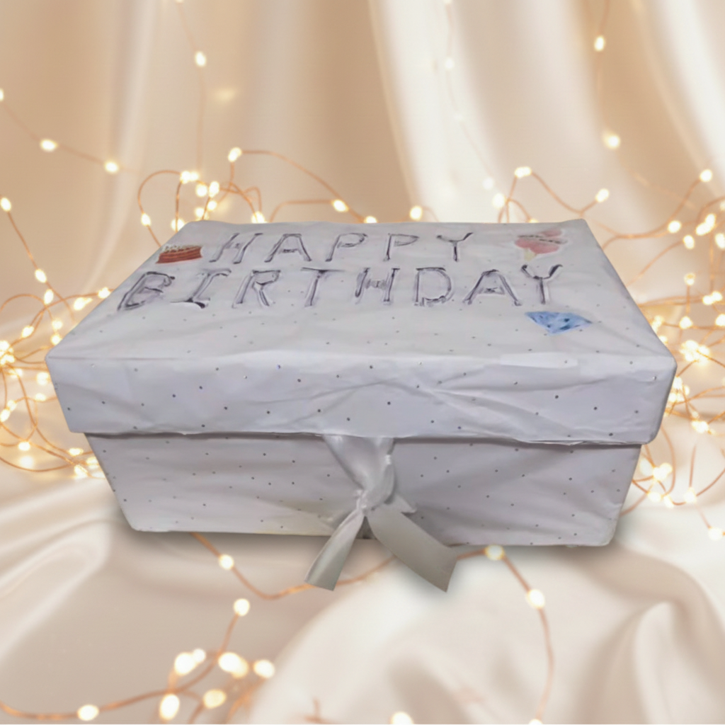 Birthday Gift Box on Cream Backdrop